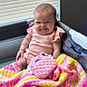 baby, infant, child, smiling, sitting, portrait, playpen, blanket, crochet, colorful, pink, yellow, toy, plush_toy, indoor, window, blinds, clothing, happy, cozy