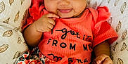 Amara joined the competition — help win amazing prizes! baby, child, smiling, headband, bow, clothing, skirt, floral, pattern, blanket, cute, portrait, happy, infant, face, person, lying, soft, bright, colorful