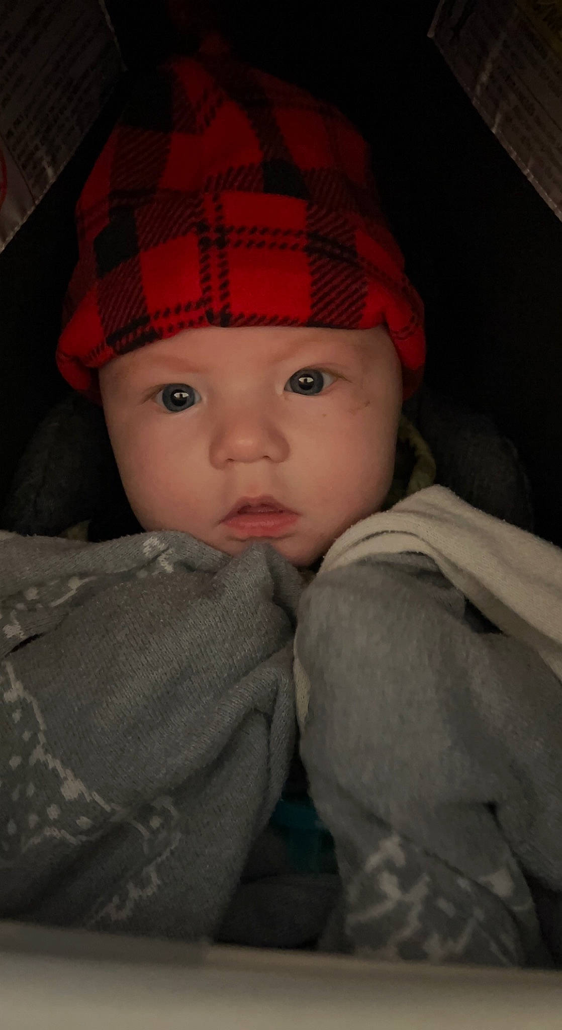 Walker is registered to the contest to win money with this photo: baby, beanie, cap, cheek, comfort, eye, fashion_accessory, flash_photography, hat, headgear, headwear, knit_cap, lip, pattern, person, plaid, sleeve, tartan, tints_and_shades, toddler