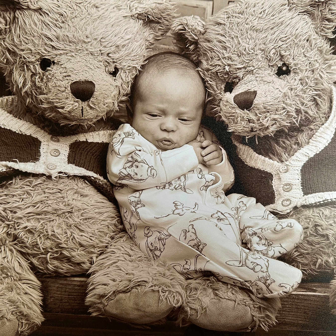 Oaklen is registered to the contest to win money with this photo: baby, chair, clothing, costume, couch, cushion, face, furniture, hat, head, homedecor, newborn, person, photography, plush, portrait, sitting, sleeping, teddybear, toy