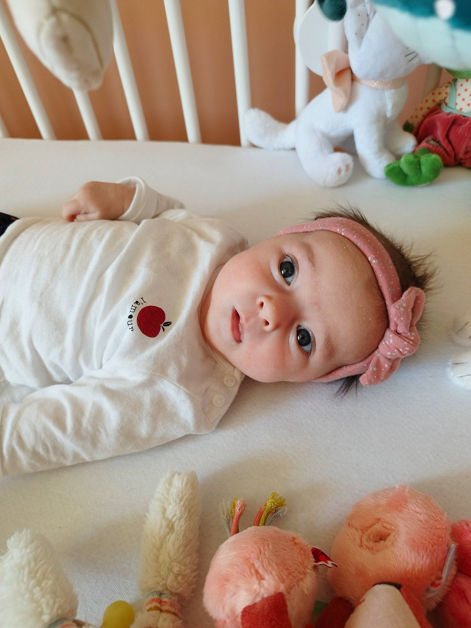 Ava participe au concours pour gagner de l'argent avec cette photo : baby, baby_products, baby_safety, baby_sleeping, baby_toddler_clothing, cheek, child, comfort, happy, headwear, linens, mouth, nail, person, pink, product, room, skin, smile, textile