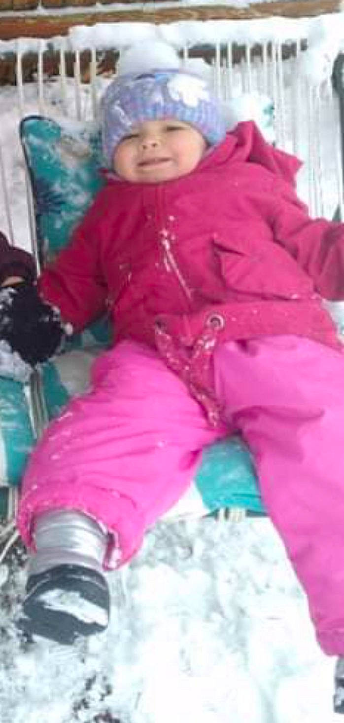 Ivy Rose is registered to the contest to win money with this photo: baby, baby_toddler_clothing, cheek, child, comfort, freezing, fun, headwear, hood, hoodie, joy, knit_cap, magenta, outerwear, person, pink, purple, sitting, sleeve, smile