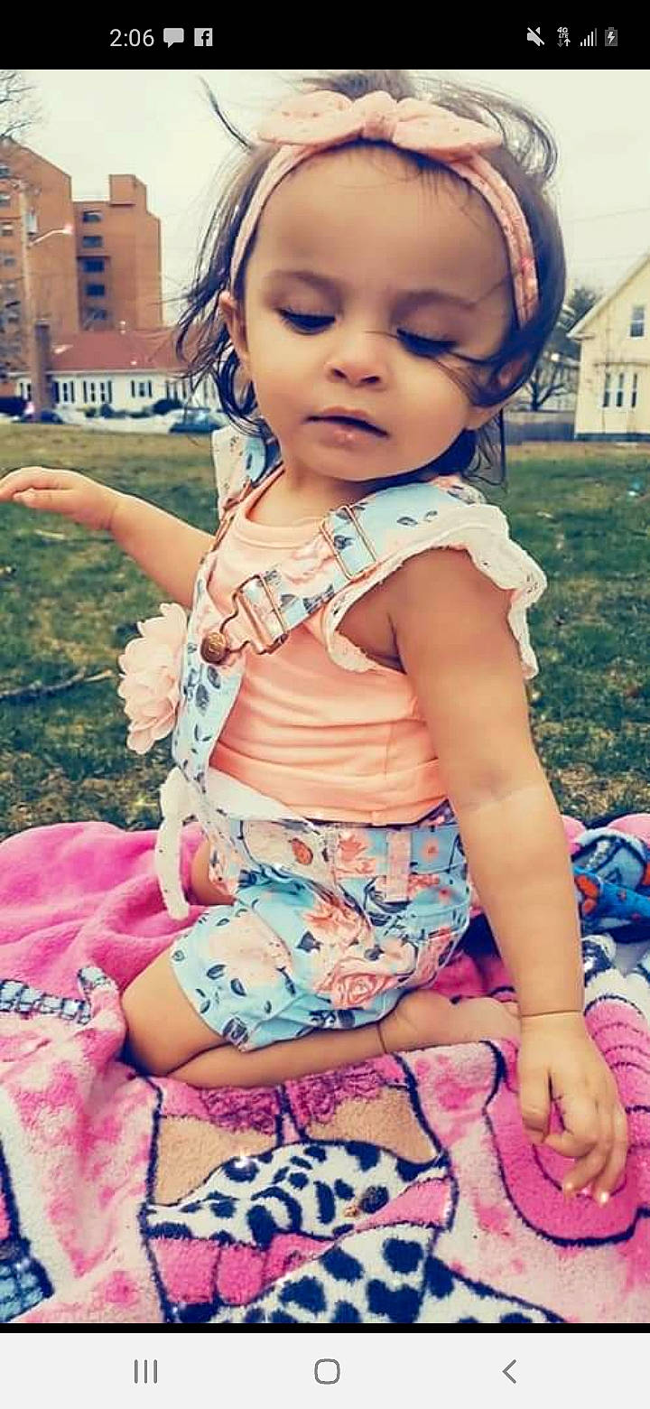 Ariah Lynn is registered to the contest to win money with this photo: baby_toddler_clothing, blue, eye, face, facial_expression, fun, grass, hairstyle, happy, head, human_body, organ, person, photograph, pink, skin, sunlight, toddler, white, window