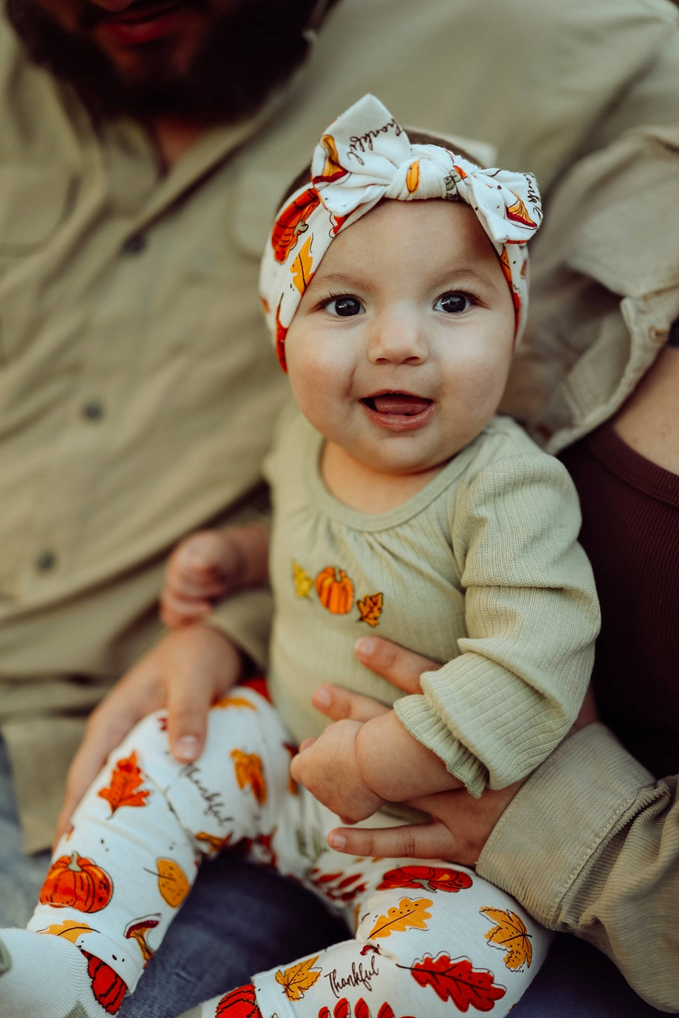 Analynn joined the competition — help win amazing prizes! baby, baby_toddler_clothing, cap, child, event, fashion_accessory, fun, grass, happy, hat, headband, headwear, mammal, pattern, person, sitting, skin, sleeve, smile, toddler