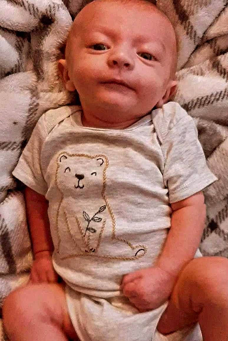 Liam joined the competition — help win amazing prizes! baby, baby_toddler_clothing, cheek, child, chin, eye, facial_expression, gesture, happy, human, lip, mouth, nose, person, pink, skin, sleeve, smile, t_shirt, toddler
