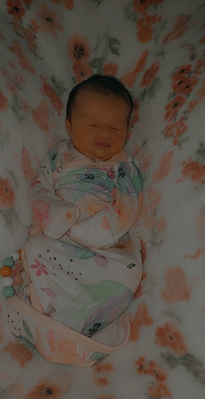 Kenzley is registered to the contest to win money with this photo: baby, baby_products, baby_toddler_clothing, bedtime, cheek, chest, child, comfort, doll, drawing, linens, pattern, peach, person, plastic, room, sitting, sleeve, textile, toddler