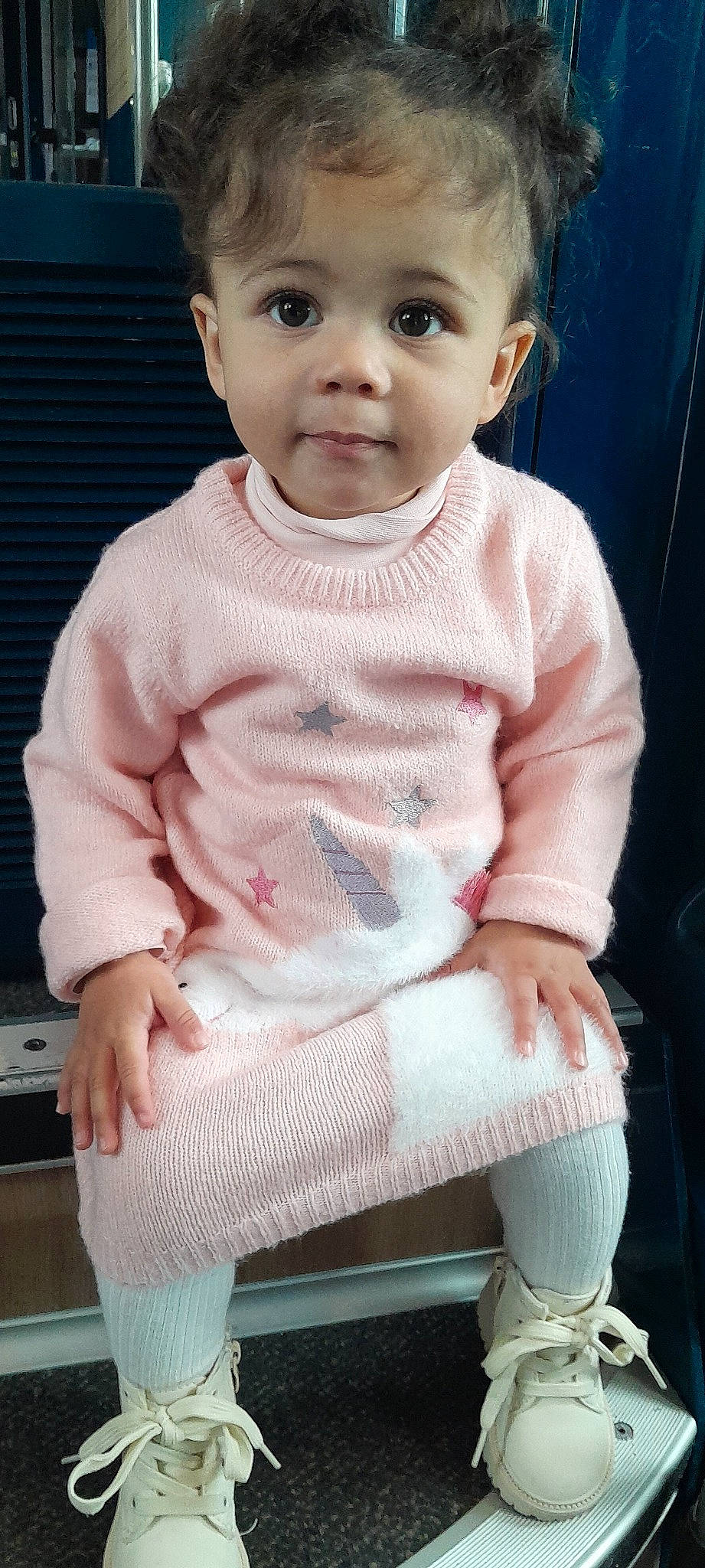 Leyanah participe au concours pour gagner de l'argent avec cette photo : baby, baby_products, baby_toddler_clothing, blue, cheek, child, collar, dress, eyelash, happy, lip, neck, outerwear, pattern, person, pink, sitting, sleeve, t_shirt, toddler