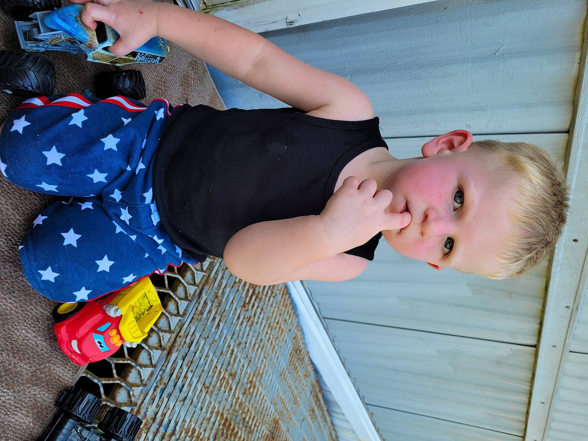 Dagan joined the competition — help win amazing prizes! arm, child, electric_blue, flooring, fun, happy, human_leg, joint, knee, leisure, pattern, person, play, sitting, thigh, toddler, vacation, waist, wood