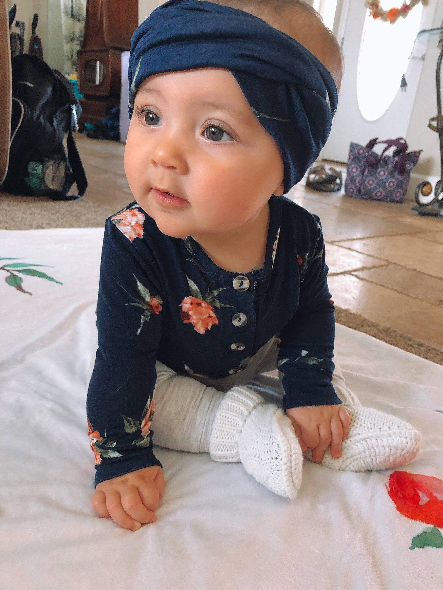 Ellee joined the competition — help win amazing prizes! baby, baby_toddler_clothing, black_hair, cheek, child, cool, face, head, headgear, outerwear, person, sitting, skin, sleeve, smile, toddler