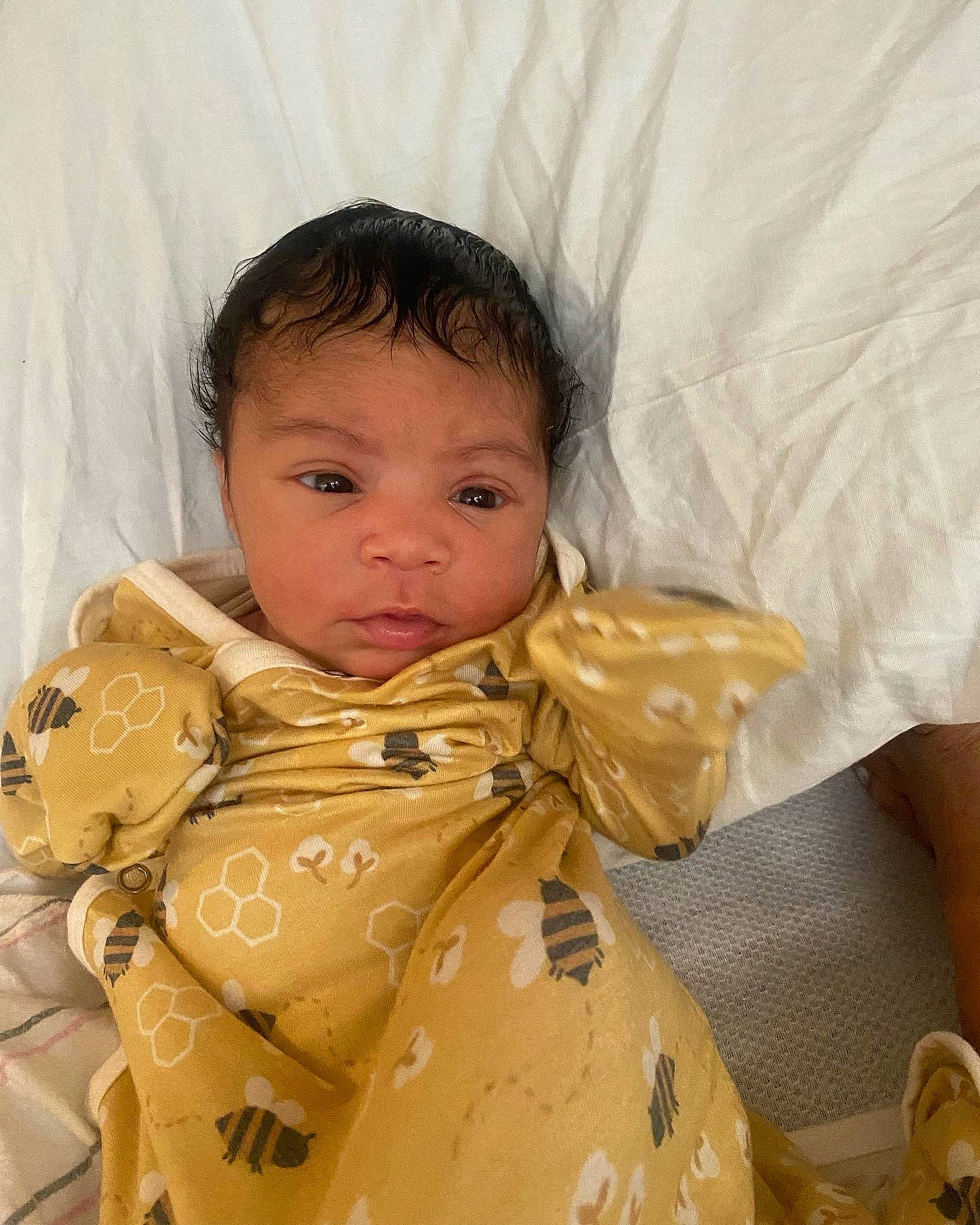 Amara joined the competition — help win amazing prizes! baby, baby_toddler_clothing, bag, cheek, comfort, eye, face, fur, happy, iris, jacket, linens, neck, nose, outerwear, person, personal_protective_equipment, room, sitting, sleeve