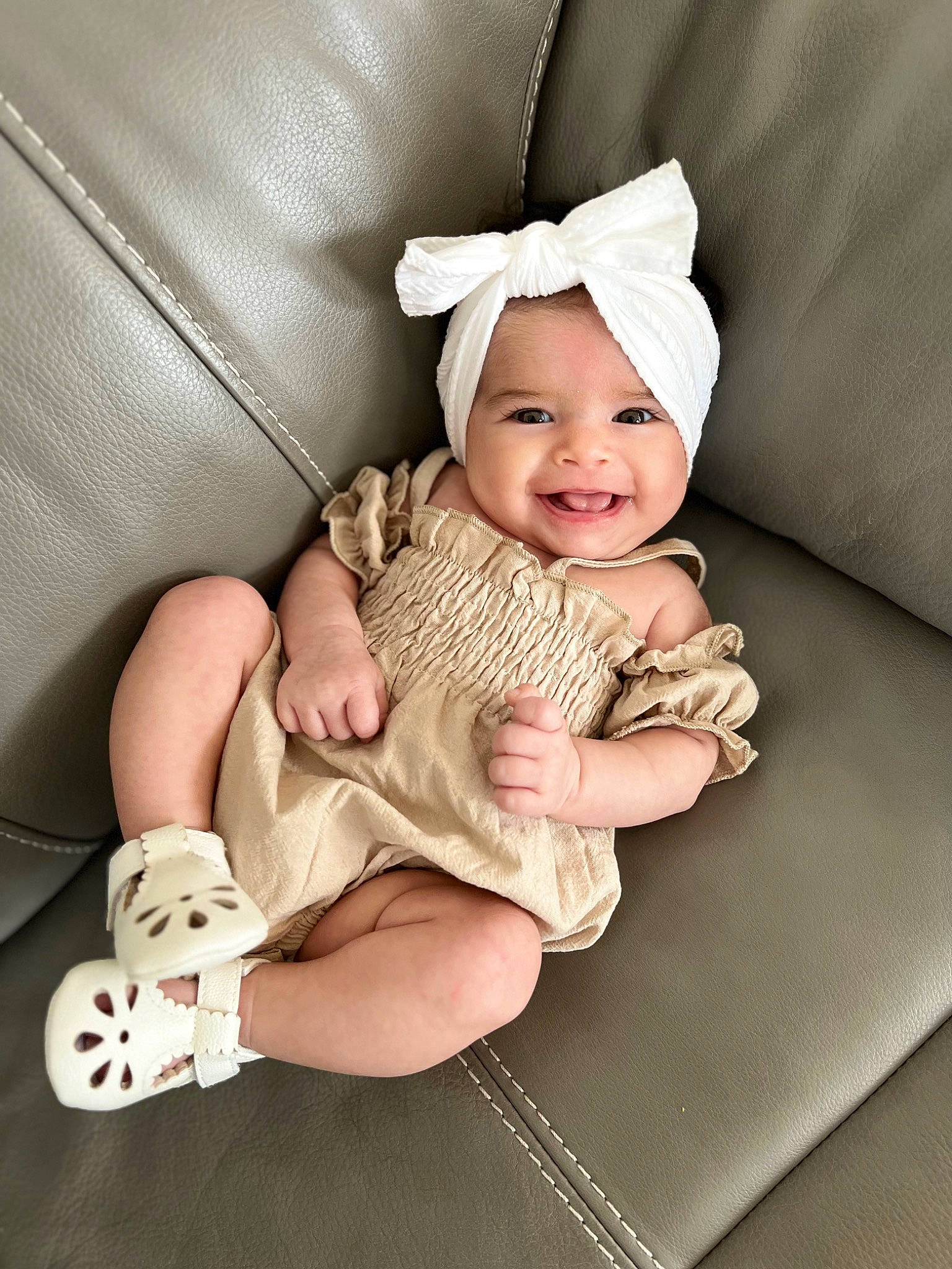 Briella joined the competition — help win amazing prizes! baby, baby_products, baby_toddler_clothing, child, comfort, fashion_accessory, foot, happy, headwear, human_leg, joy, linens, nail, pattern, person, sitting, skin, sleeve, smile, sock