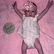 Hazel joined the competition — help win amazing prizes! baby, infant, pink_blanket, headband, flower, two_months_sign, arms_up, striped_outfit, cute, newborn, lying_down, milestone, soft_texture, child, portrait, baby_clothes, happy, small_hands, baby_face, celebration