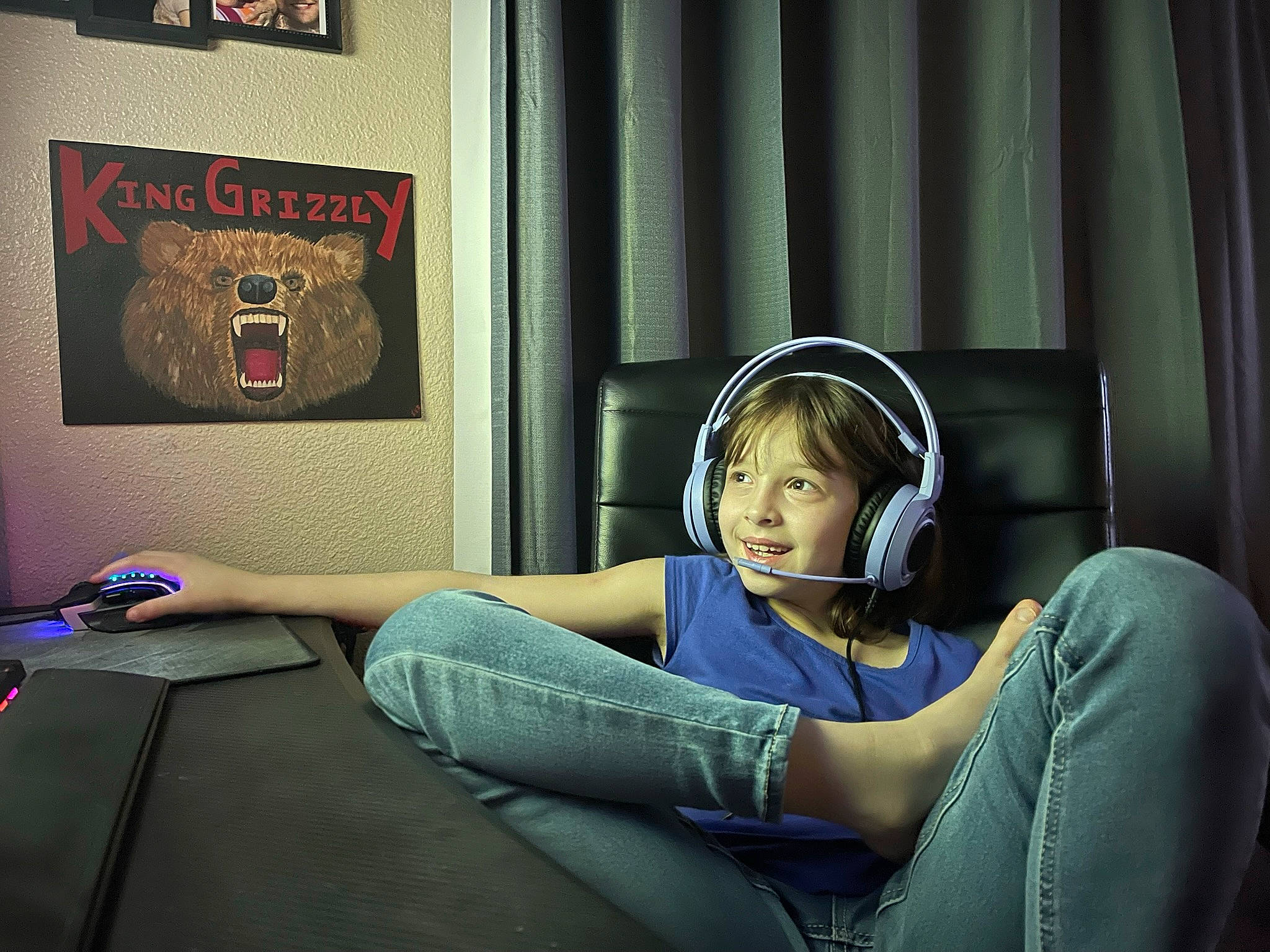 Dixie-lynn is registered to the contest to win money with this photo: audio_equipment, automotive_design, chair, comfort, couch, curtain, darkness, denim, eyewear, flash_photography, fun, furniture, gadget, human_leg, knee, living_room, person, room, sitting, thigh