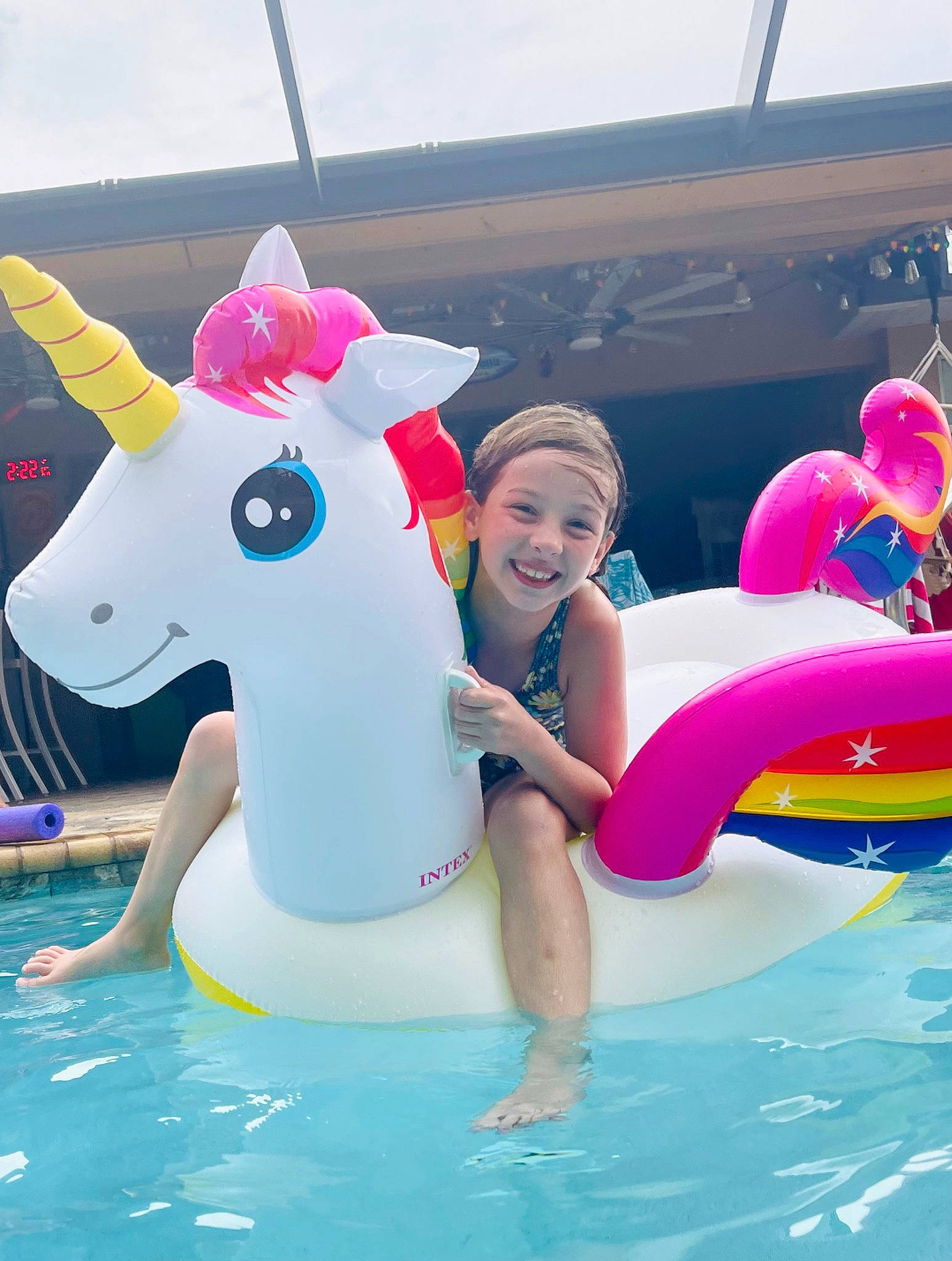 Dixie-lynn is registered to the contest to win money with this photo: amusement_park, fun, games, happy, hat, inflatable, joy, leisure, leisure_centre, magenta, mammal, nonbuilding_structure, outdoor_recreation, person, personal_protective_equipment, pink, play, recreation, smile, swimming_pool