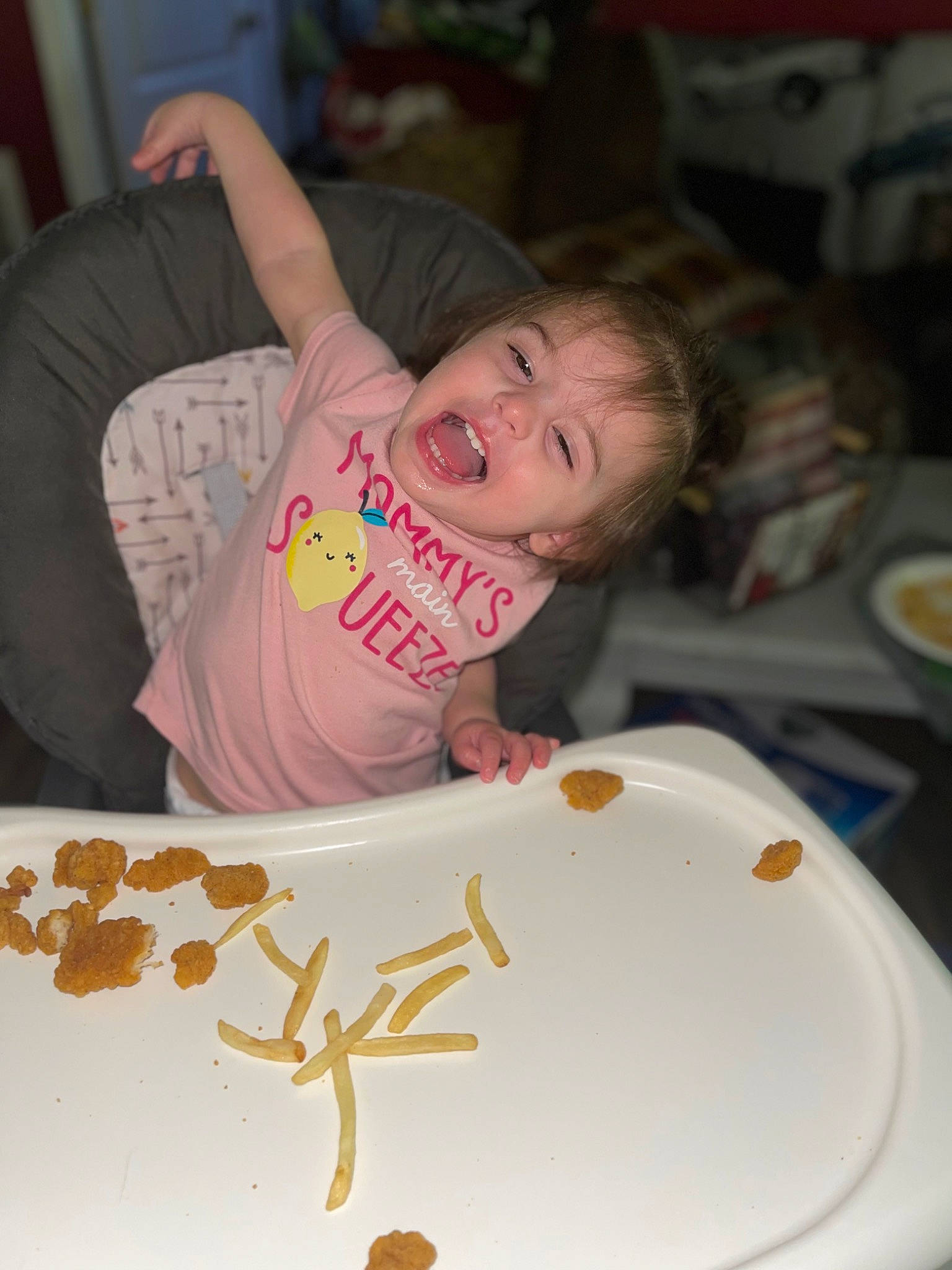 Magnolia is registered to the contest to win money with this photo: baby, chair, child, cuisine, dishware, event, finger, food, fun, handwriting, happy, icing, mouth, person, plate, smile, sweetness, t_shirt, table, tableware