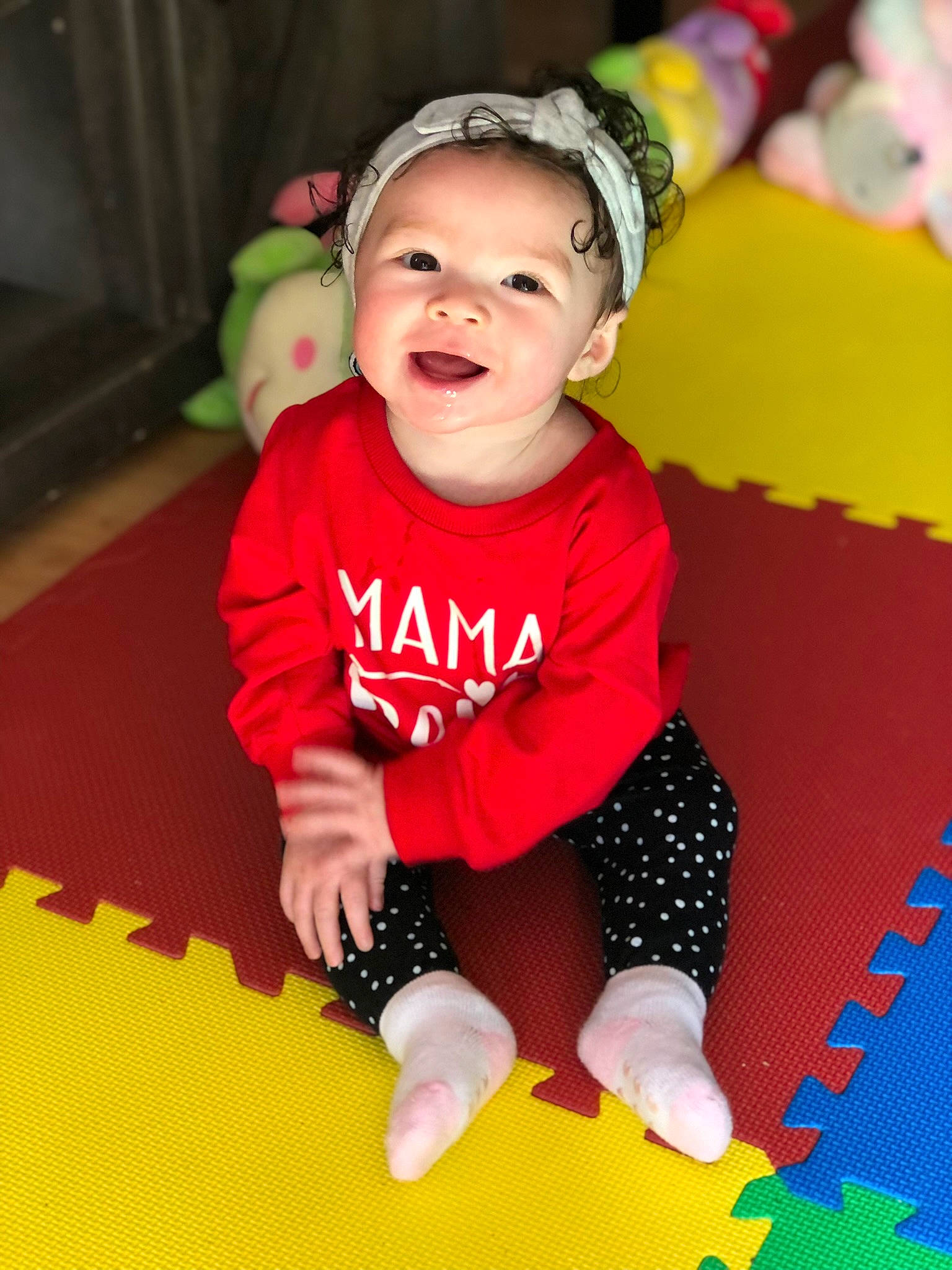 Mylah joined the competition — help win amazing prizes! baby, baby_toddler_clothing, cap, child, curtain, facial_expression, flash_photography, flooring, fun, grass, happy, headwear, magenta, pattern, person, pink, sitting, sleeve, smile, sock