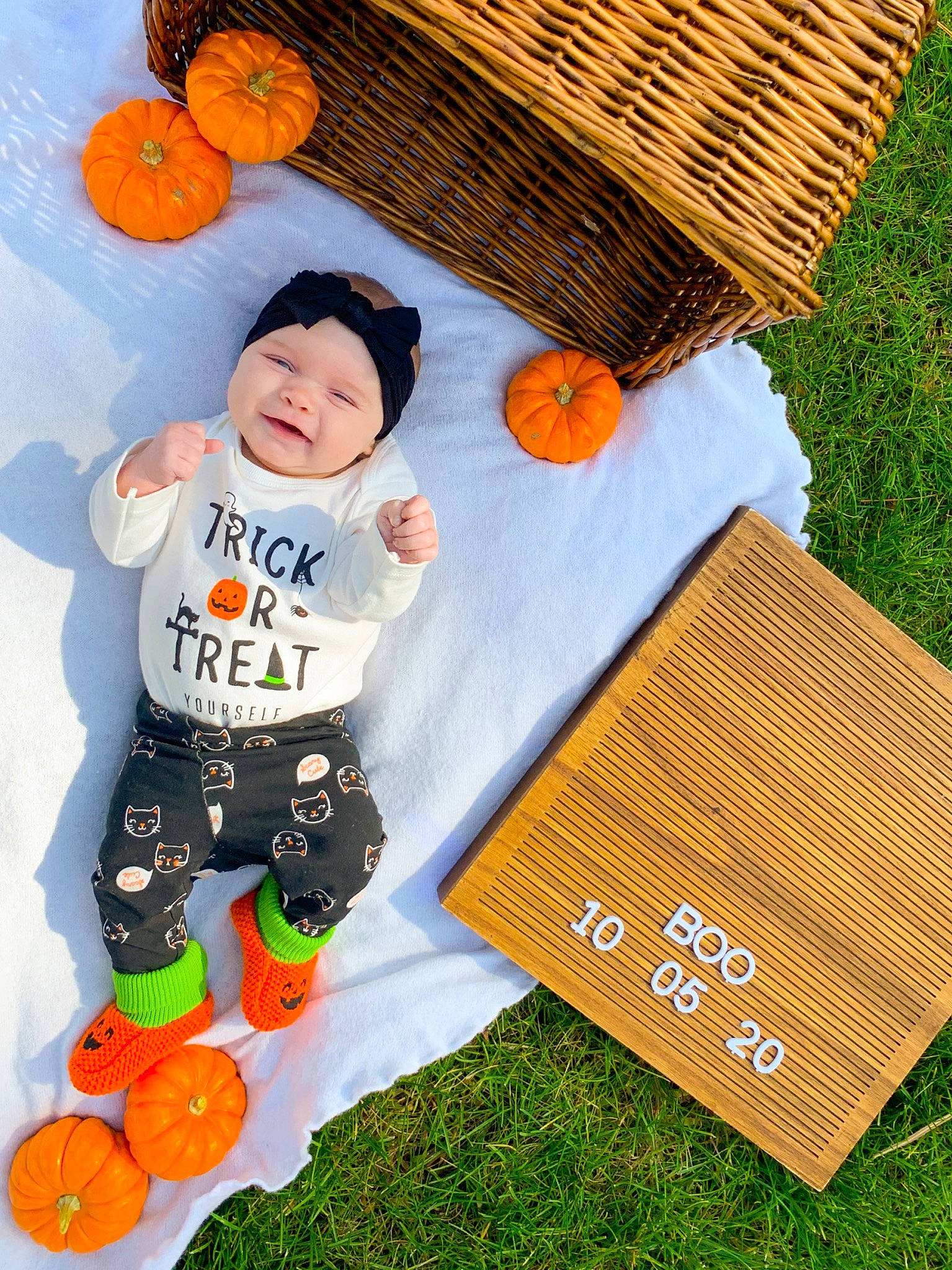 Brinley joined the competition — help win amazing prizes! baby, baby_toddler_clothing, child, grass, headwear, person, play, t_shirt, toddler