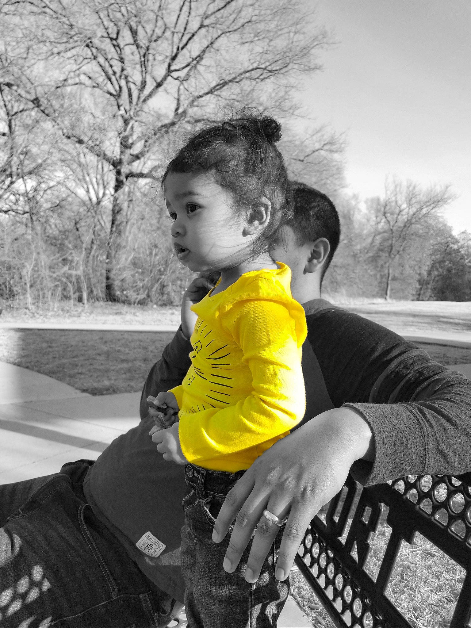 Jaxonn is registered to the contest to win money with this photo: black_and_white, child, cool, happy, jacket, person, personal_protective_equipment, photography, play, sitting, smile, style, toddler, tree, winter, yellow