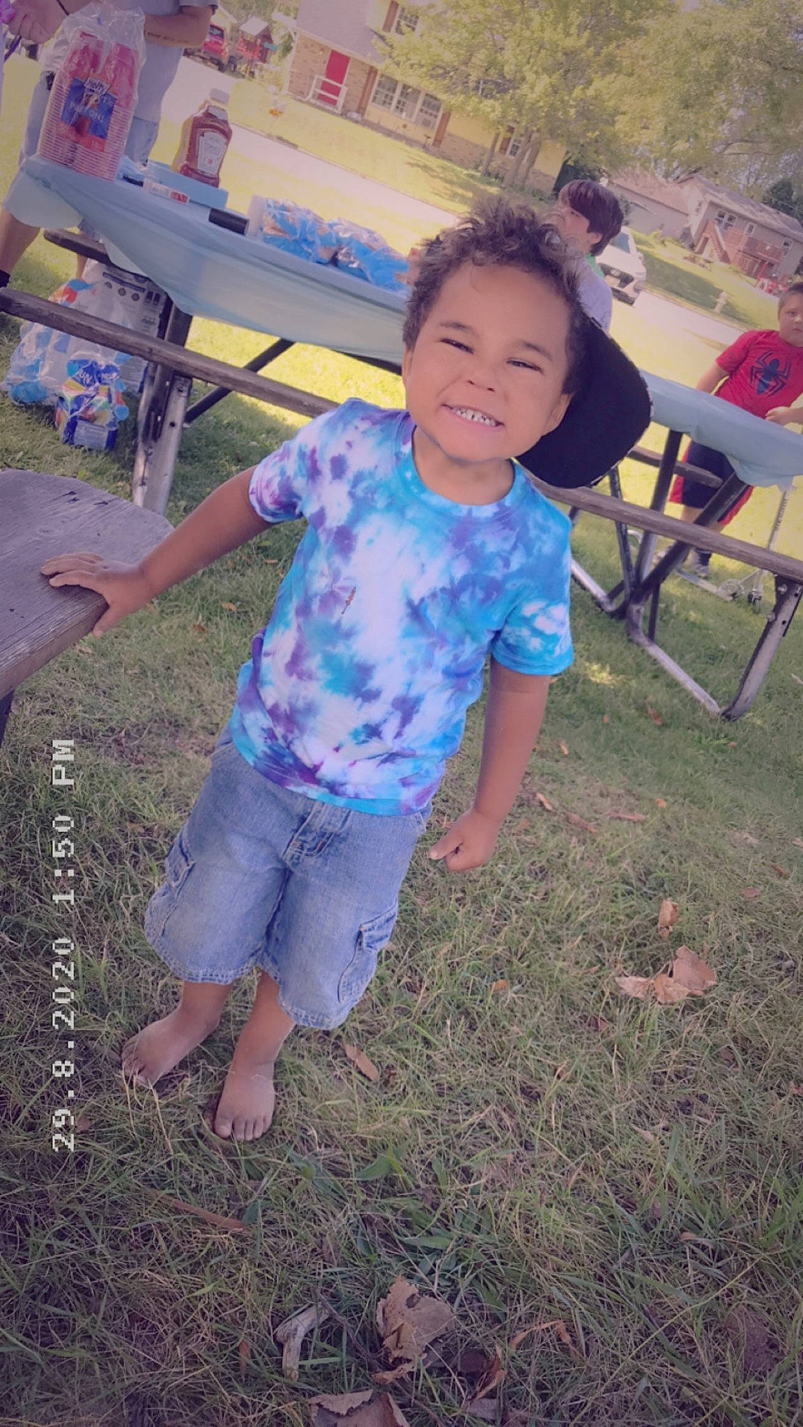 Davien joined the competition — help win amazing prizes! barefoot, blurred, chair, child, foot, fun, garden, grass, happy, human_leg, joy, landscape, leisure, people_in_nature, person, plant, play, recreation, shorts, sitting