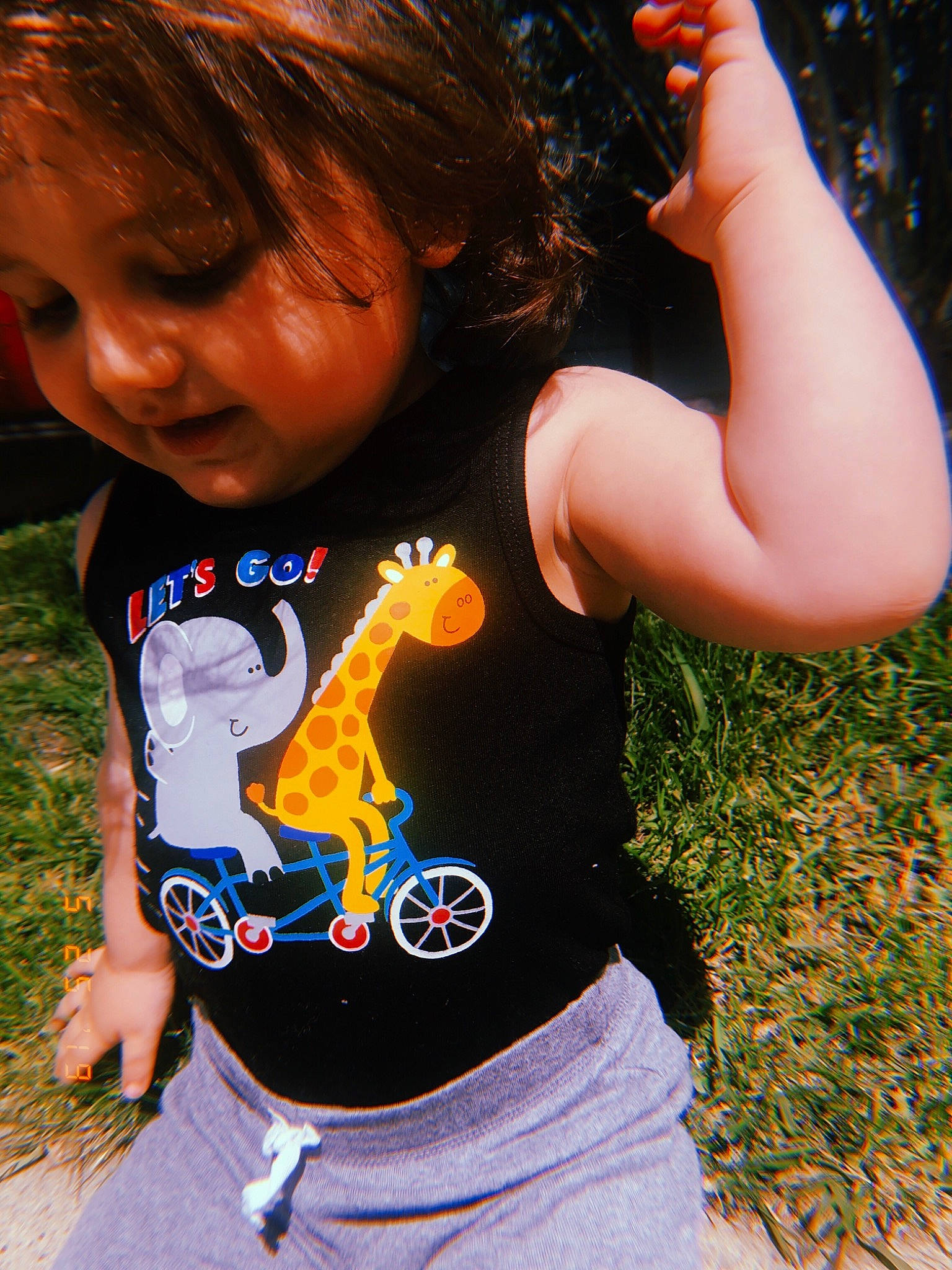 Atreyu is registered to the contest to win money with this photo: arm, child, cool, finger, hand, headwear, joy, muscle, neck, person, sleeve, smile, t_shirt, thumb