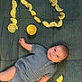 Liam a rejoint le concours — aidez-le/la à gagner de superbes lots ! baby, infant, lemon, fruit, green_blanket, smile, portrait, clothing, cute, milestone, baby_outfit, lying_down, yellow, fresh, citrus, texture, skin, hand, legs, happy
