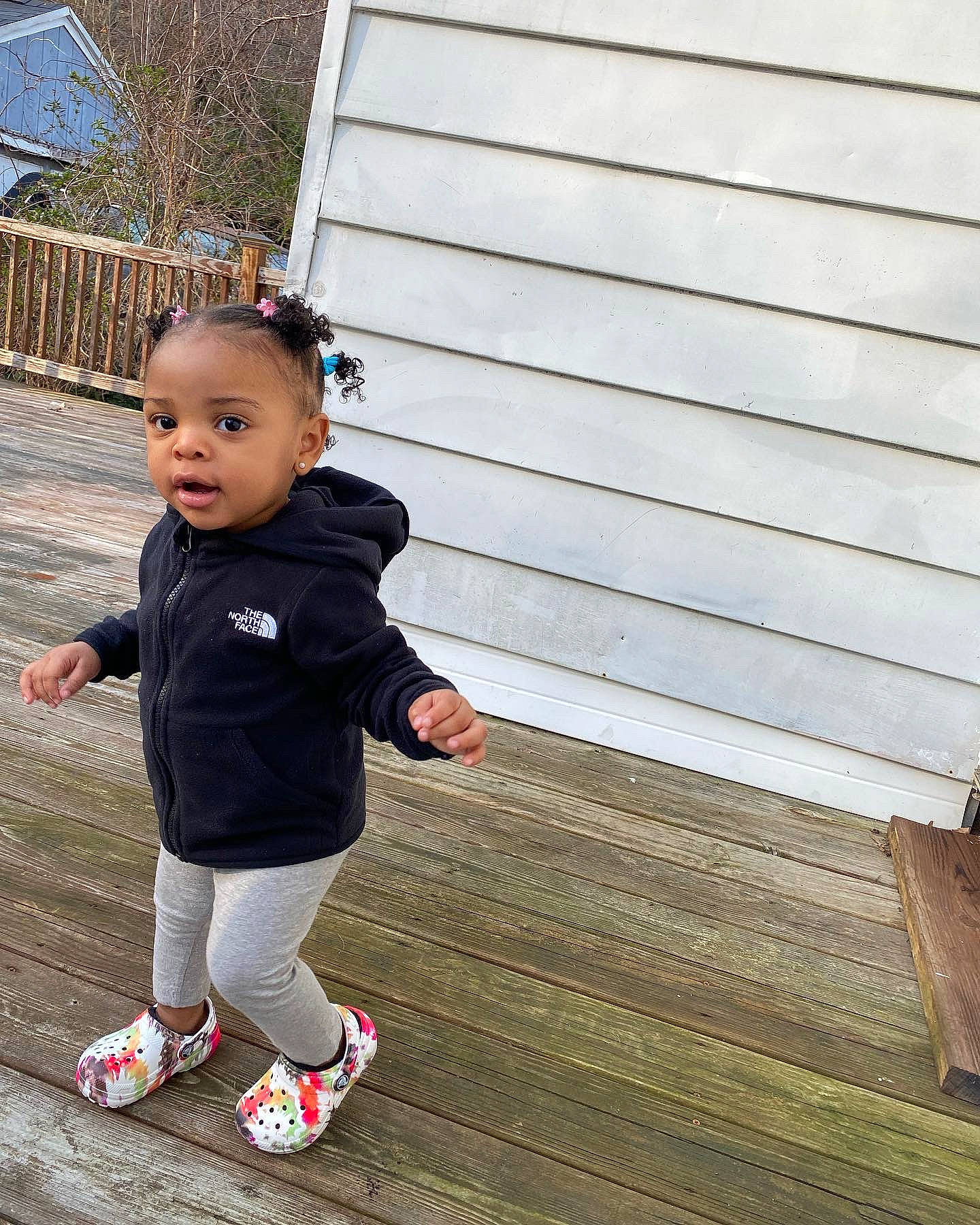 Lailah joined the competition — help win amazing prizes! baby, baby_toddler_clothing, child, flooring, fun, grass, happy, hardwood, leisure, people_in_nature, person, plant, recreation, sandal, siding, sock, tints_and_shades, toddler, tree, walking