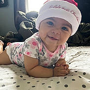 Nadia is registered to the contest to win money with this photo: baby, babycrawling, bed, bedroom, blanket, bonnet, cap, clothing, crawling, cushion, face, furniture, happy, hat, head, homedecor, person, photography, portrait, smile
