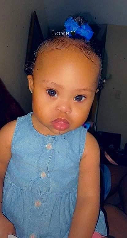 Taisley Reign is registered to the contest to win money with this photo: baby_toddler_clothing, blue, cheek, dress, ear, eye, eyebrow, eyelash, face, forehead, hand, head, human_body, lip, mouth, neck, nose, organ, person, purple