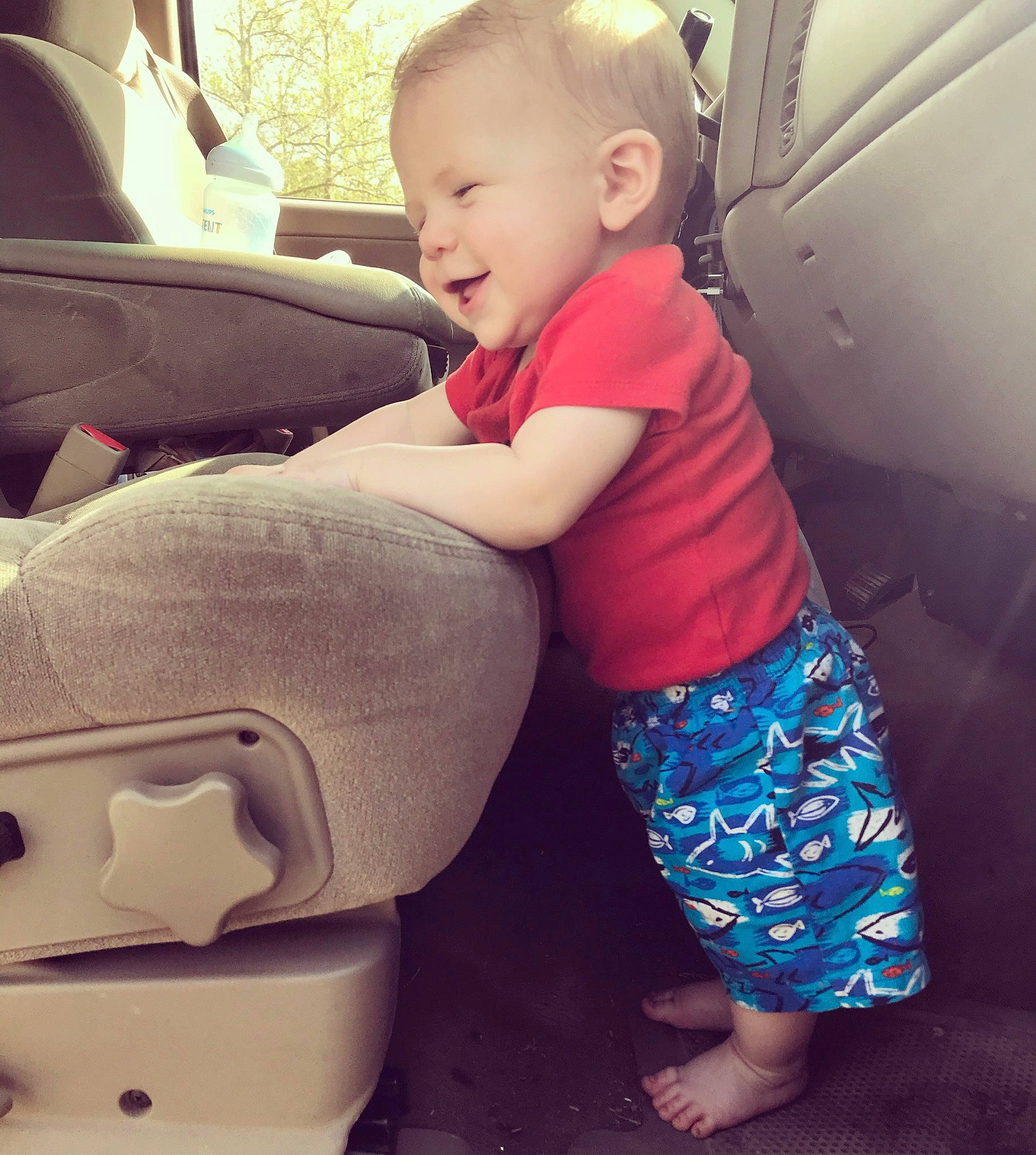 Carsyn is registered to the contest to win money with this photo: baby, baby_in_car_seat, car, car_seat, cheek, child, finger, leg, person, play, product, sitting, skin, toddler, vehicle