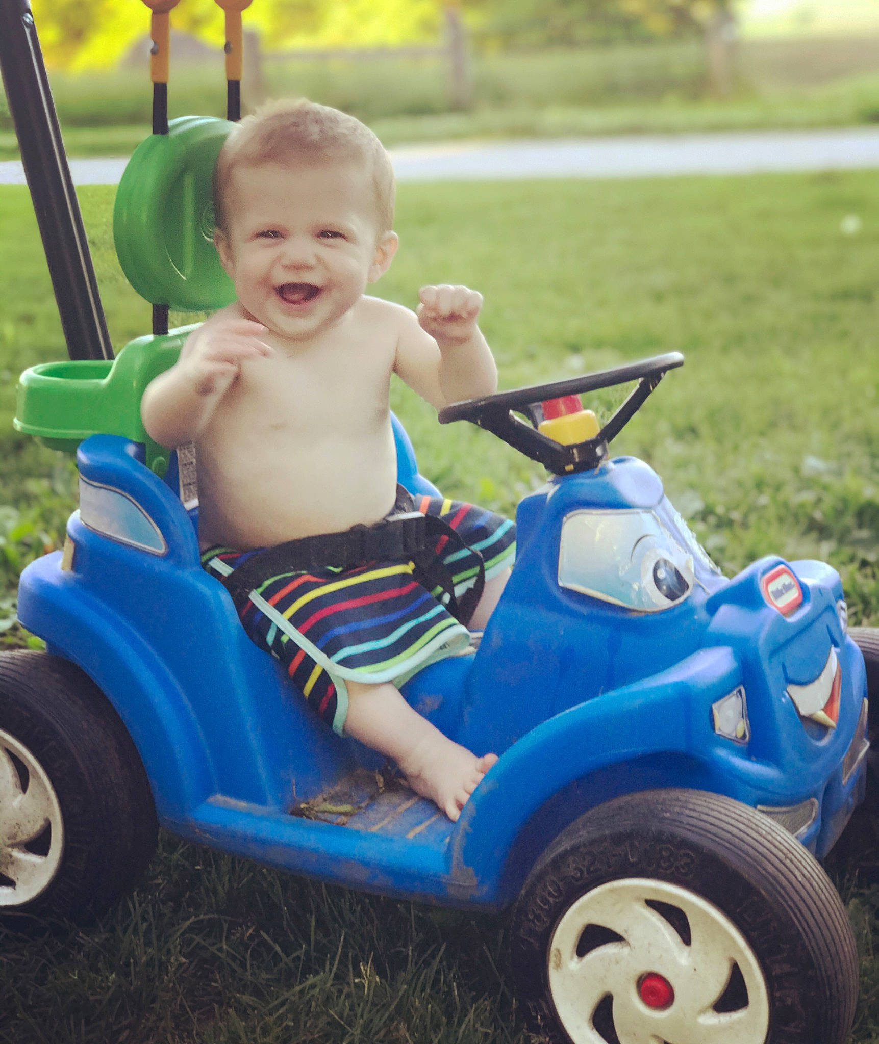 Carsyn joined the competition — help win amazing prizes! baby_products, car, child, fun, grass, joy, person, play, product, riding_toy, toddler, toy, vehicle