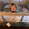 James joined the competition — help win amazing prizes! toddler, child, playpen, smile, indoor, cushion, toy, happy, face, curtain, window, floor, blanket, furniture, person, hair, clothing, baby, home, daylight