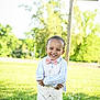 Izlan joined the competition — help win amazing prizes! bow_tie, boy, child, cross, cute, daytime, formal_clothing, grass, greenery, happy, nature, outdoor, pants, person, portrait, smiling, standing, sunlight, trees, vest