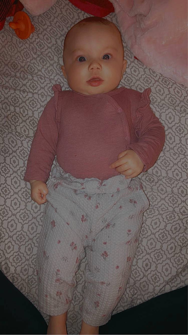 Lakelyn joined the competition — help win amazing prizes! baby, baby_products, baby_toddler_clothing, cheek, comfort, eye, face, head, knee, linens, lip, neck, pattern, person, pink, sitting, skin, sleeve, stomach, textile