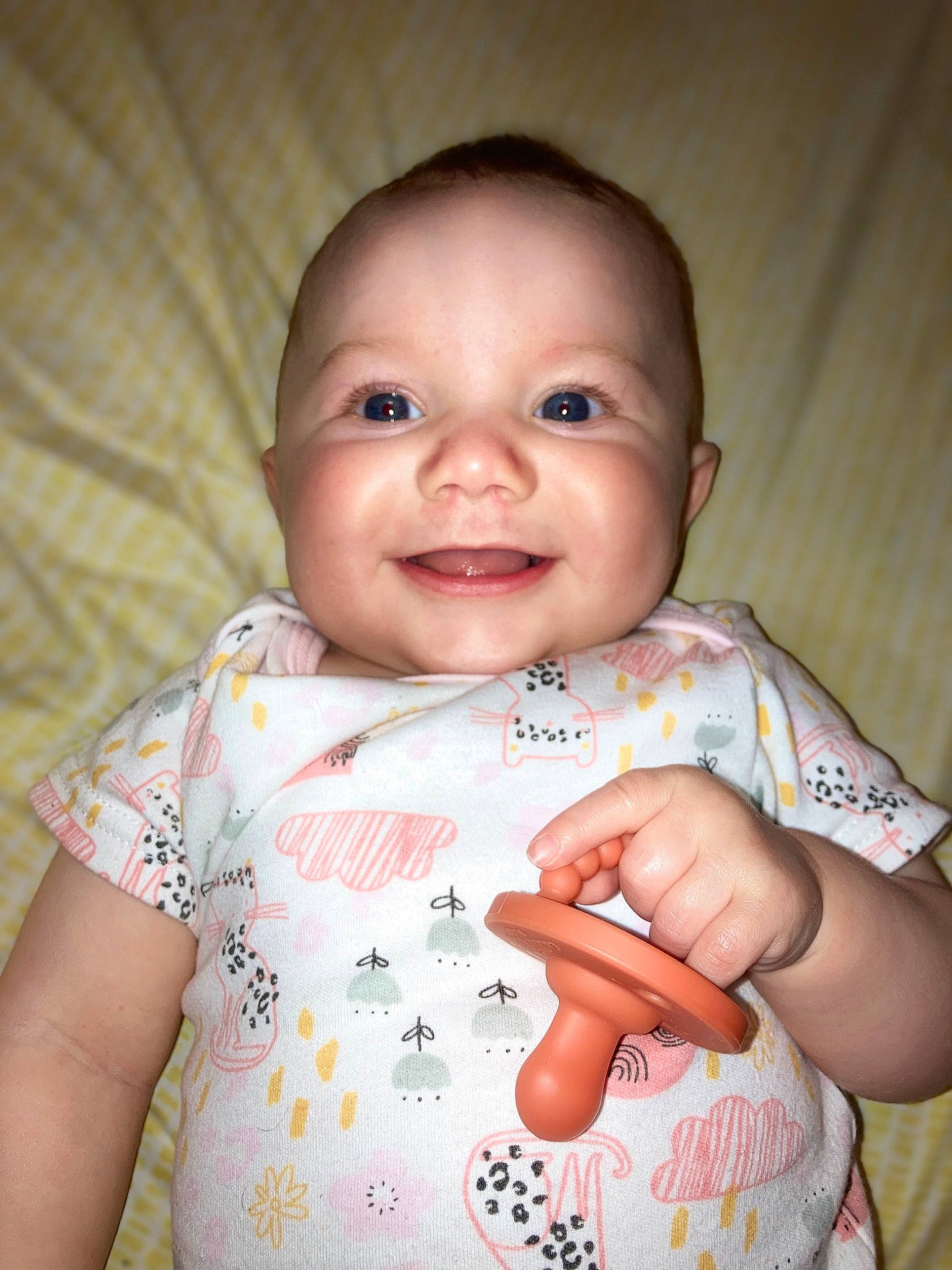 Lakelyn is registered to the contest to win money with this photo: arm, baby, baby_toddler_clothing, cheek, chin, eye, eyebrow, facial_expression, forehead, hair, hairstyle, hand, iris, joy, lip, mouth, neck, nose, person, skin
