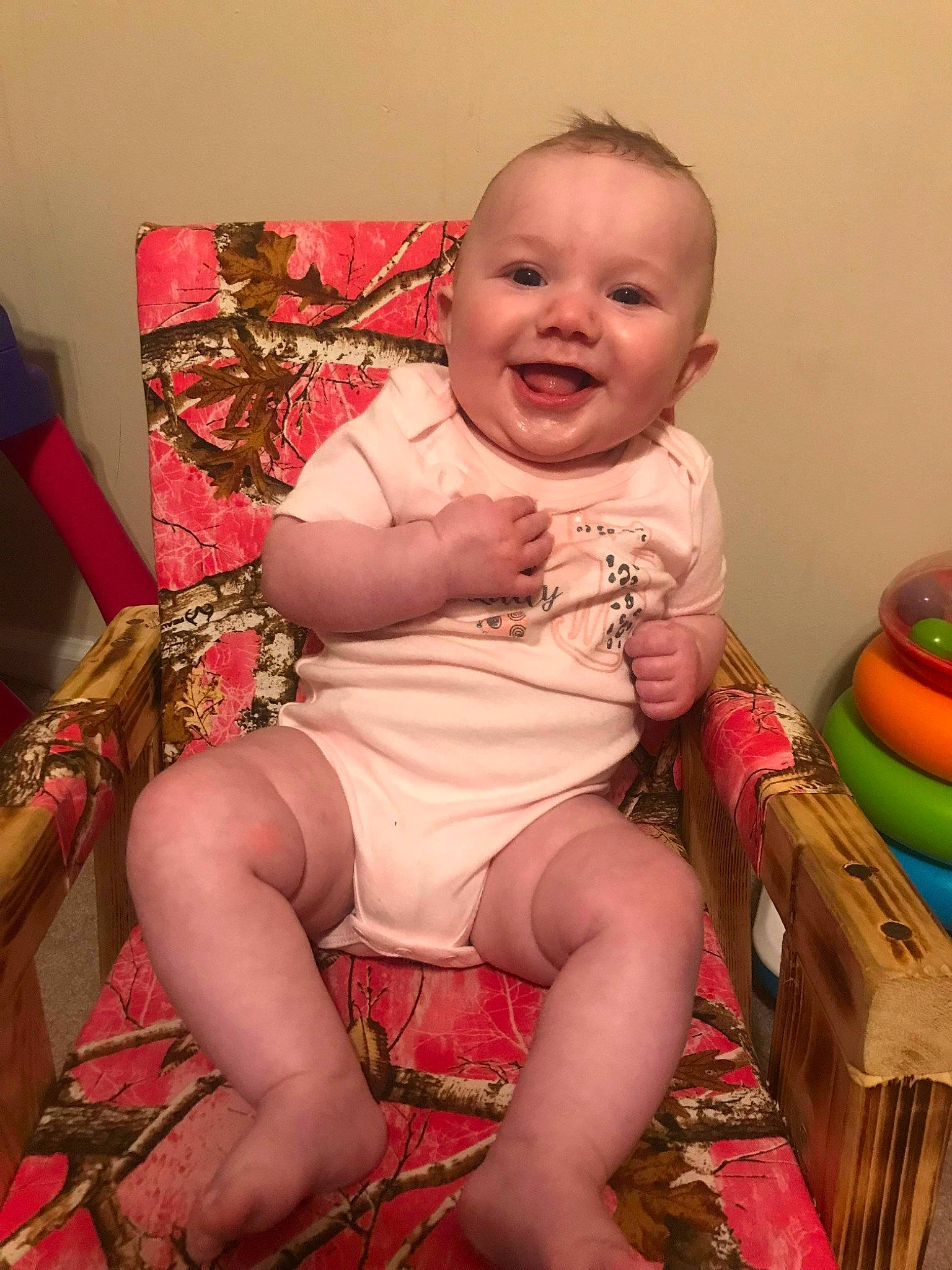 Lakelyn joined the competition — help win amazing prizes! baby, baby_toddler_clothing, chair, cheek, comfort, dress, eye, finger, hairstyle, happy, head, iris, joy, knee, lip, mouth, person, pink, skin, smile