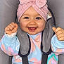 Maëline participe au concours pour gagner de l'argent avec cette photo : baby, child, smiling, headband, pink_bow, car_seat, sweater, straps, happy, infant, cute, indoors, child_seat, clothing, person, portrait, baby_girl, seatbelt, joyful, raising_fists