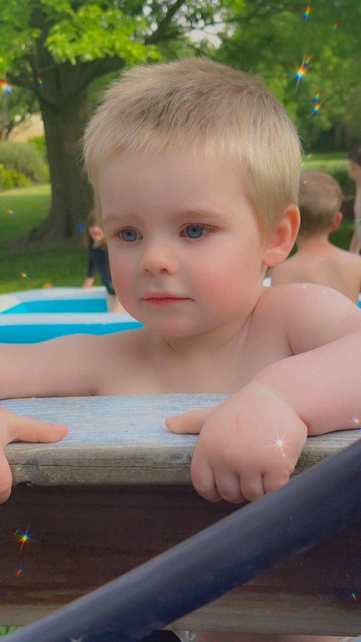 Carter is registered to the contest to win money with this photo: child, chin, eye, face, facial_expression, finger, fun, grass, hair, hairstyle, happy, human_body, leisure, muscle, person, plant, skin, standing, summer, toddler