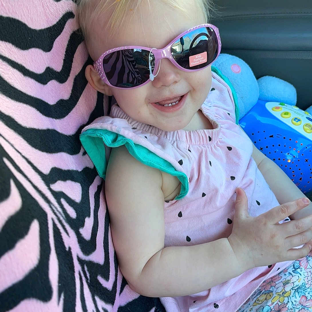 Maya joined the competition — help win amazing prizes! baby_toddler_clothing, child, cool, eyewear, fun, glasses, goggles, hair, happy, head, leisure, magenta, pink, purple, sleeve, smile, sunglasses, toddler, vision_care, white