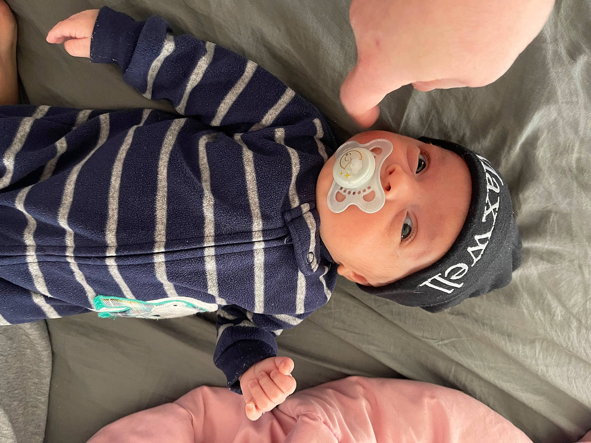Maxwell joined the competition — help win amazing prizes! abdomen, arm, chest, child, comfort, elbow, finger, gesture, headwear, human_leg, joint, knee, leg, neck, person, plaid, sleeve, tartan, thigh, toddler