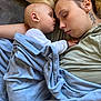Camille a rejoint le concours — aidez-le/la à gagner de superbes lots ! baby, child, woman, sleeping, blanket, bed, comfort, rest, relaxation, skin, face, head, person, tattoo, hand, clothing, closeup, indoor, nap, cozy