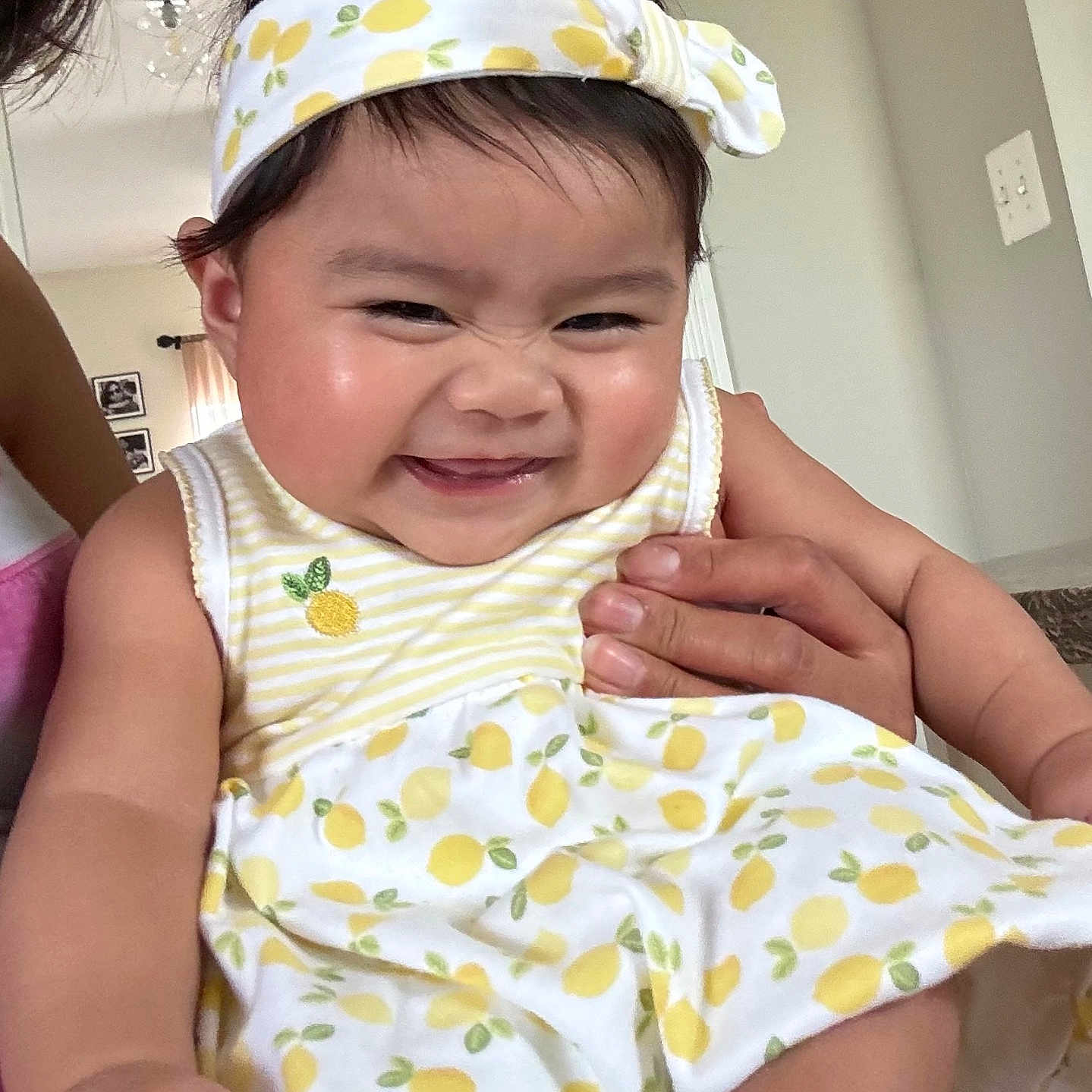 Mariko Kaimo joined the competition — help win amazing prizes! baby, cheeks, child, clothing, cute, dress, face, hand, happy, headband, holding, indoor, infant, pattern, person, skin, smiling, toddler, white, yellow