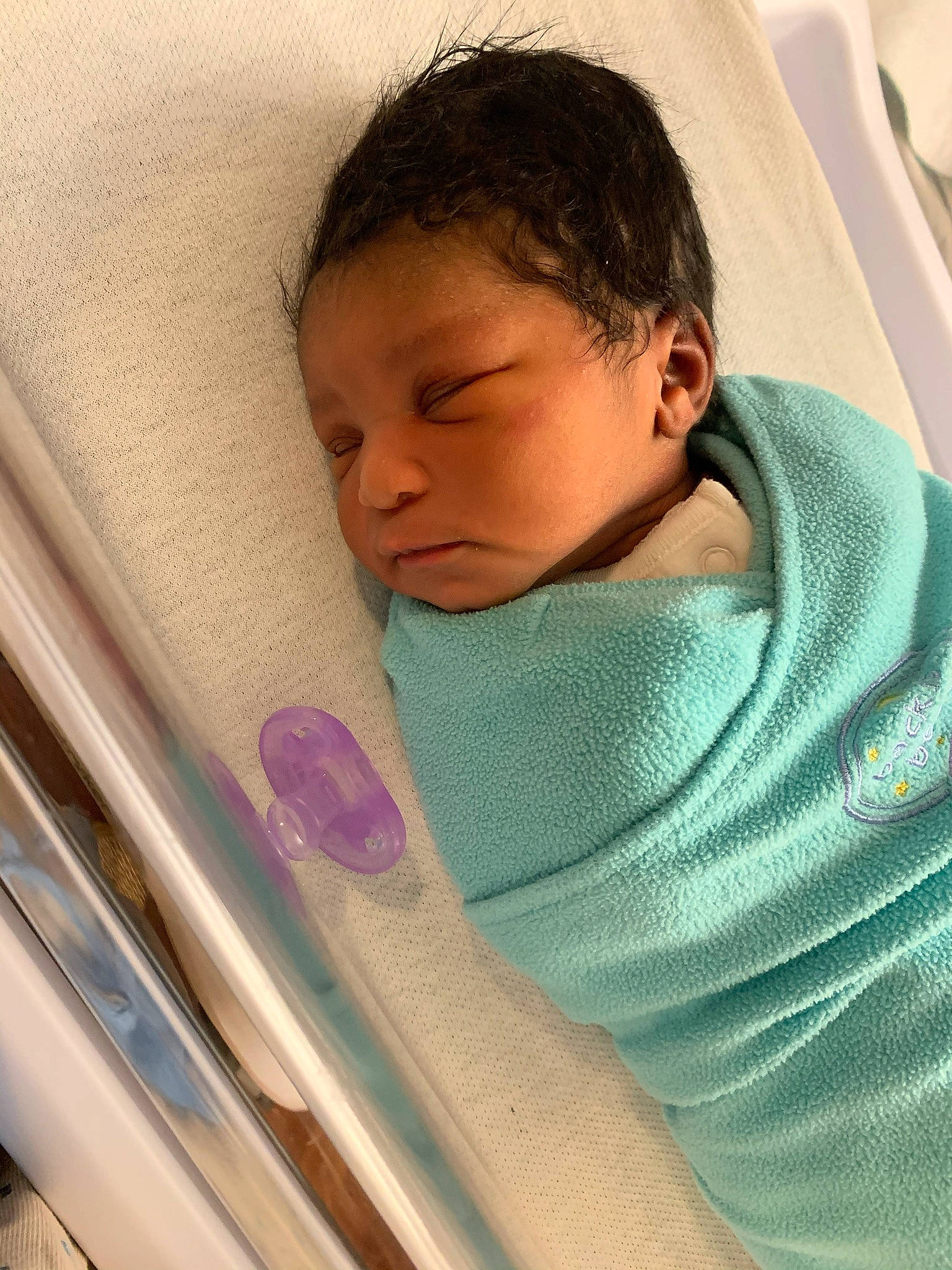 Ashanti is registered to the contest to win money with this photo: baby, baby_products, baby_safety, baby_sleeping, bed, bedding, bedtime, child, comfort, eye, eyebrow, infant_bed, linens, nap, nose, person, room, t_shirt, textile, toddler