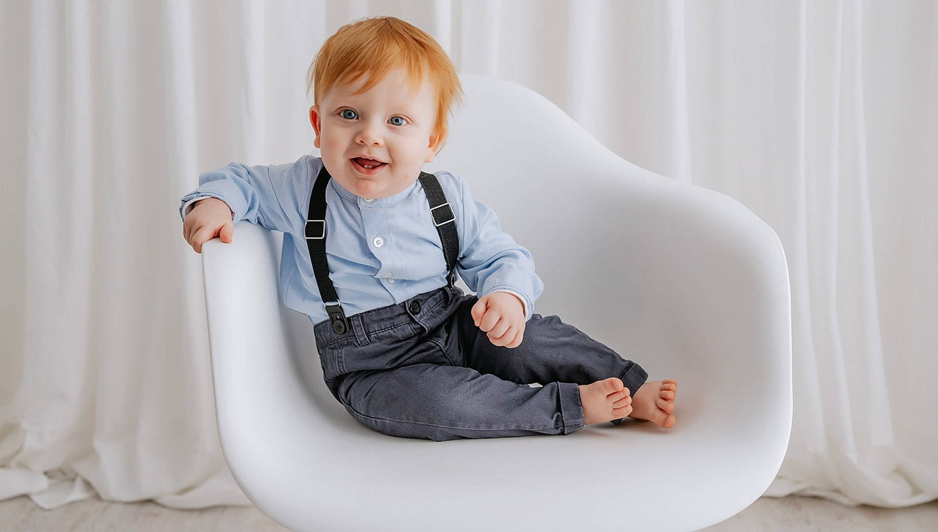 Toby is registered to the contest to win money with this photo: baby, baby_toddler_clothing, child, collar, comfort, dress_shirt, elbow, facial_expression, flash_photography, hairstyle, happy, human_leg, joy, knee, person, product, sitting, sleeve, smile, standing