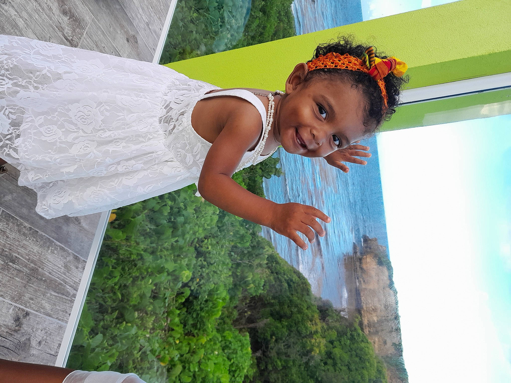 Dayana participe au concours pour gagner de l'argent avec cette photo : azure, bridal_accessory, cloud, dress, electric_blue, event, fashion, flash_photography, fun, grass, happy, headpiece, joy, leisure, people_in_nature, person, sky, smile, toddler, tree