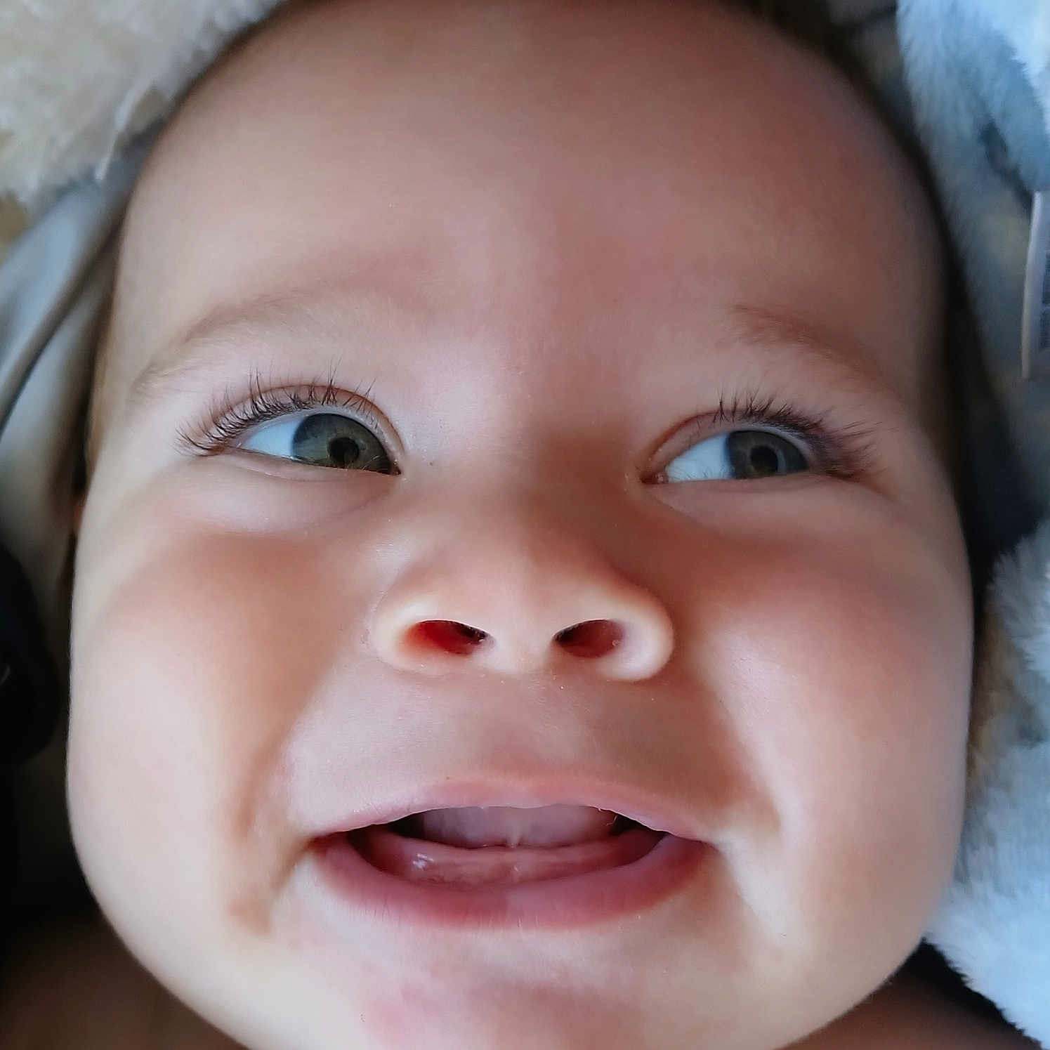 Kawikaonalaniekapu is registered to the contest to win money with this photo: adorable, baby, blanket, cheeks, child, closeup, cute, expression, eyes, face, happy, infant, mouth, newborn, pacifier, person, portrait, skin, smile, soft