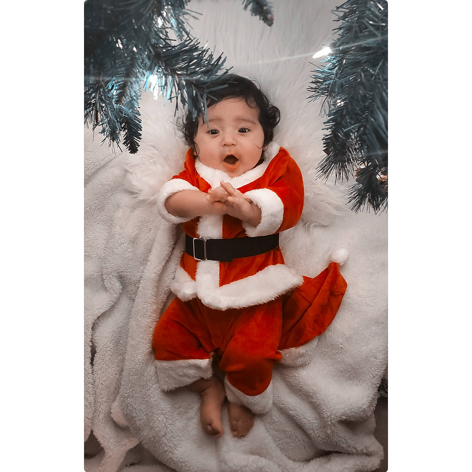 Andres joined the competition — help win amazing prizes! baby, baby_toddler_clothing, christmas_decoration, christmas_eve, christmas_ornament, christmas_tree, conifer, event, evergreen, fictional_character, happy, holiday, holiday_ornament, human_body, ornament, person, plant, shortstraw_pine, sleeve, surprise