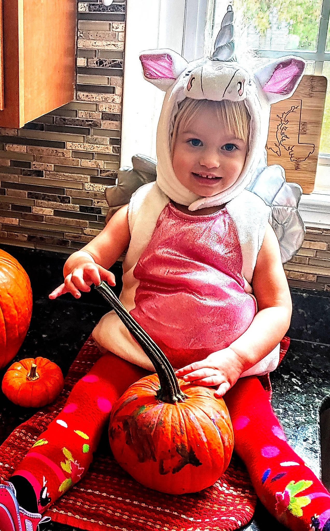 Ameline joined the competition — help win amazing prizes! baby_toddler_clothing, calabaza, clothing, cucurbita, dress, eye, facial_expression, gourd, happy, head, joy, natural_foods, orange, organ, people, person, photograph, pumpkin, smile, squash
