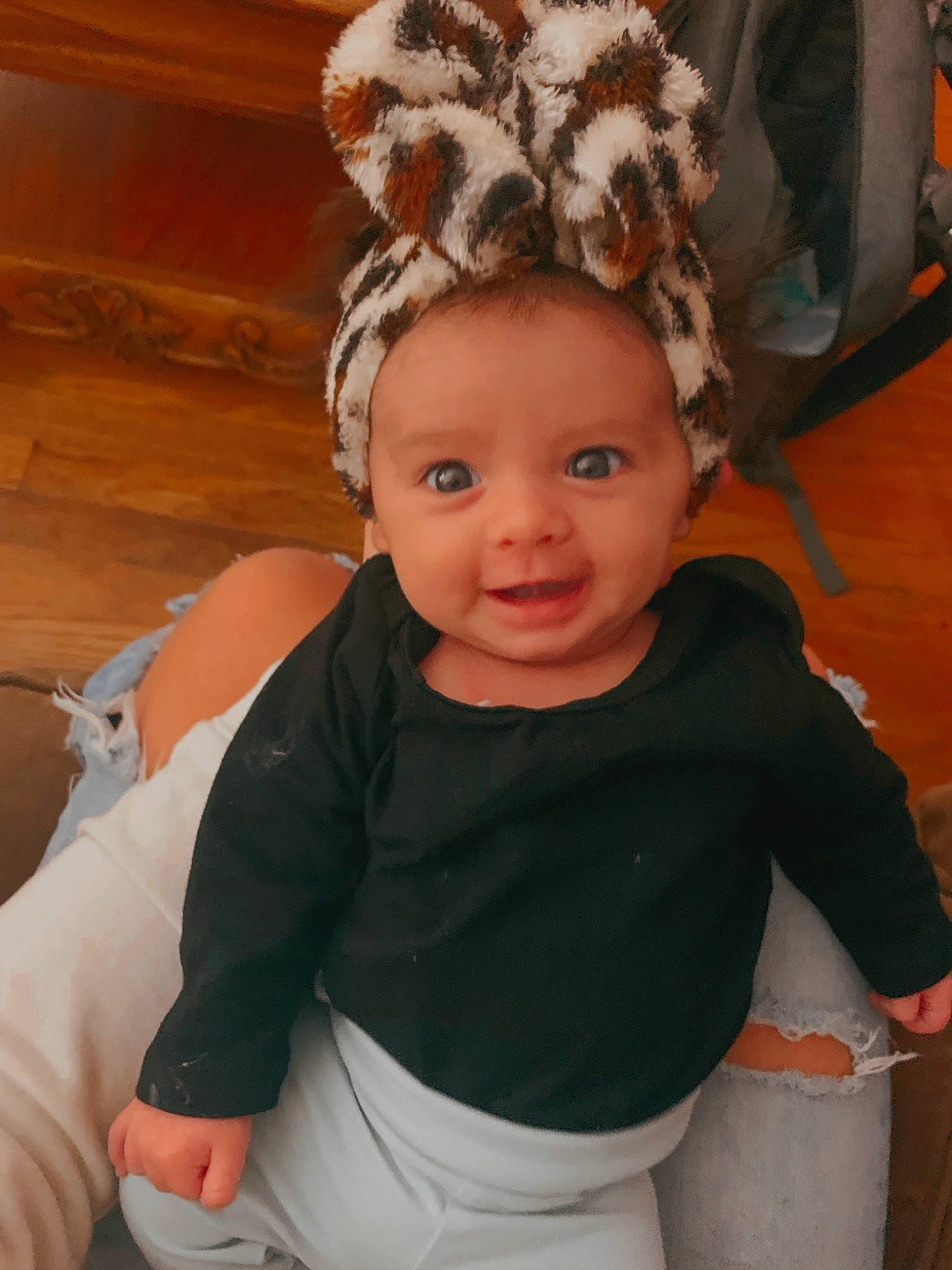 Harlee is registered to the contest to win money with this photo: arm, baby, baby_toddler_clothing, cheek, child, costume_hat, eye, fun, happy, headband, headgear, headpiece, iris, neck, person, skin, sleeve, smile, toddler, white