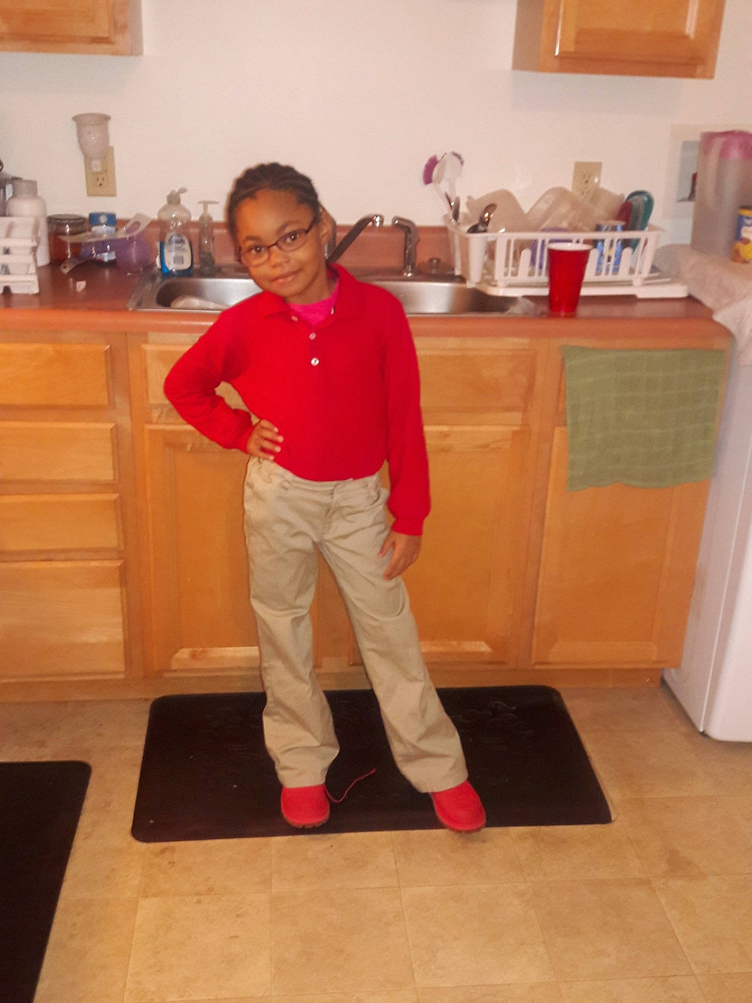 Nia joined the competition — help win amazing prizes! floor, flooring, person, room, shoulder, standing, tile, wood