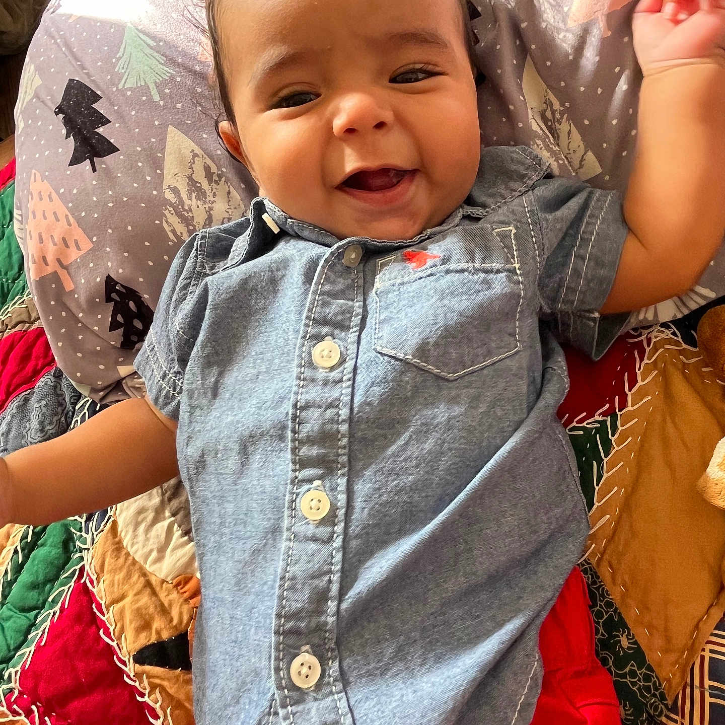 Mason is registered to the contest to win money with this photo: baby, babylaughing, clothing, coat, cushion, face, furniture, happy, head, homedecor, jeans, laughing, pants, person, photography, portrait, quilt, shirt, smile, vest